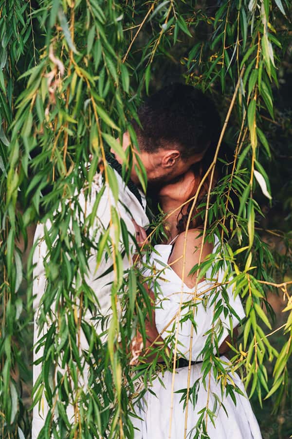 Couple kiss under the willow
